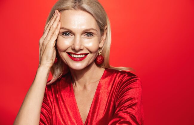 New,Year,Winter,Holidays.,Smiling,Mature,Woman,With,Red,Lipsticks,